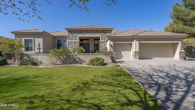 prairie-style home featuring a garage and a front lawn