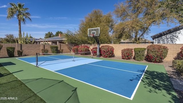 view of sport court featuring tennis court