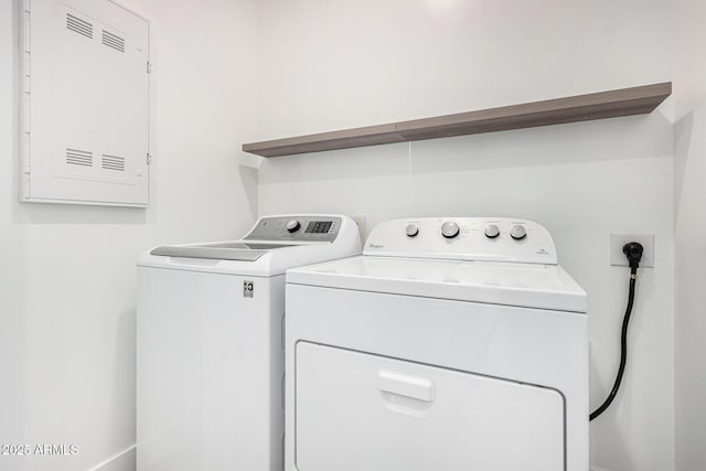 laundry area featuring separate washer and dryer