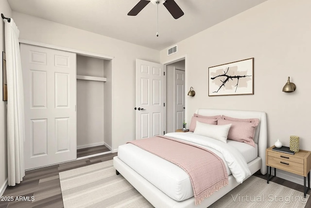 3114 W Villa Maria Dr, Phoenix, AZ 85053 - bedroom with wood finished floors, a closet, and ceiling fan