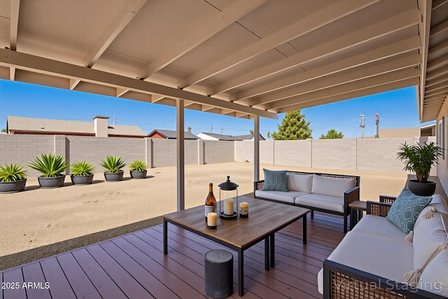 3114 W Villa Maria Dr, Phoenix, AZ 85053 - wooden deck with outdoor lounge area, a fenced backyard, and a patio area