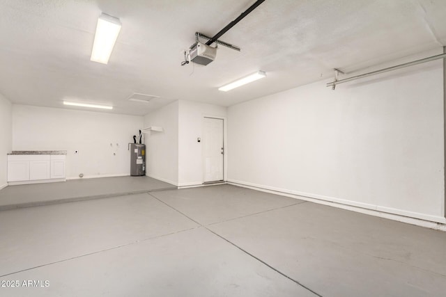 3114 W Villa Maria Dr, Phoenix, AZ 85053 - garage featuring electric water heater and a garage door opener