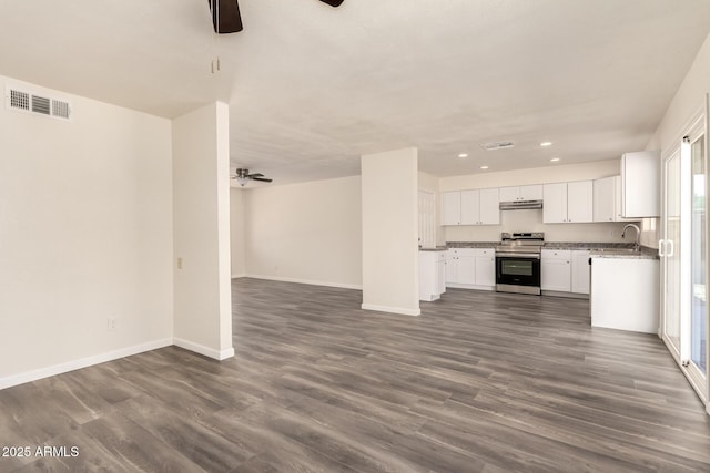 3114 W Villa Maria Dr, Phoenix, AZ 85053 - unfurnished living room with a ceiling fan, recessed lighting, and dark wood-type flooring