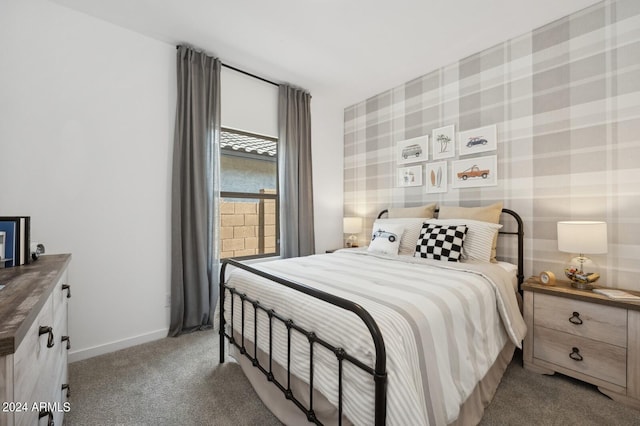 bedroom featuring light carpet