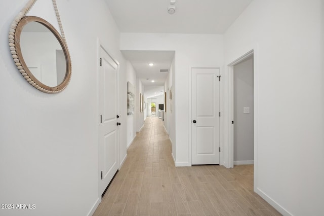 hall featuring light hardwood / wood-style floors