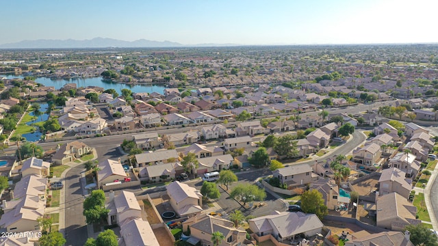 bird's eye view with a water and mountain view