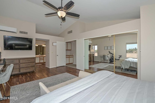 18807 N 42nd Ave, Glendale, AZ 85308 - bedroom with visible vents, wood finished floors, lofted ceiling, and a wall mounted air conditioner
