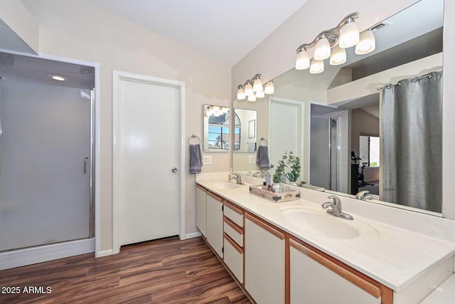 18807 N 42nd Ave, Glendale, AZ 85308 - bathroom with double vanity, visible vents, a sink, and wood finished floors