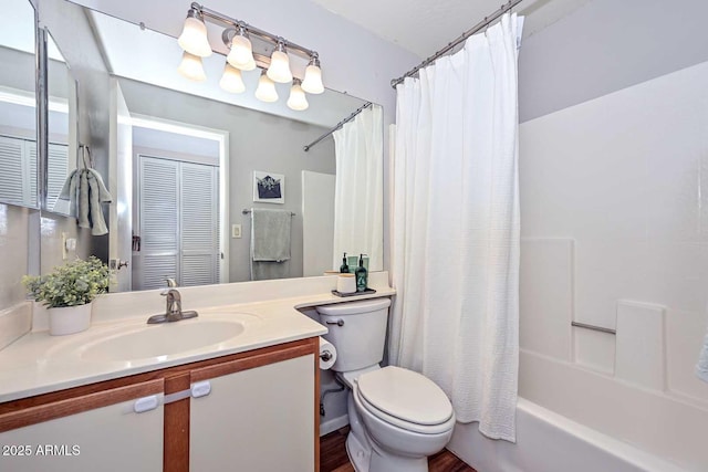 18807 N 42nd Ave, Glendale, AZ 85308 - bathroom with vanity, shower / bathtub combination with curtain, and toilet