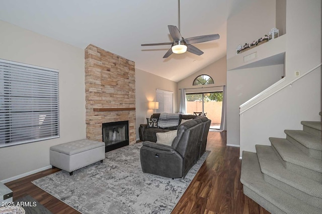 18807 N 42nd Ave, Glendale, AZ 85308 - living area with ceiling fan, a fireplace, baseboards, dark wood-type flooring, and stairway