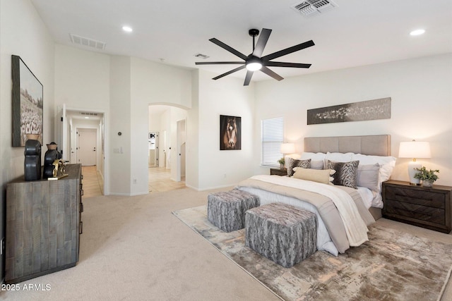 carpeted bedroom featuring ceiling fan