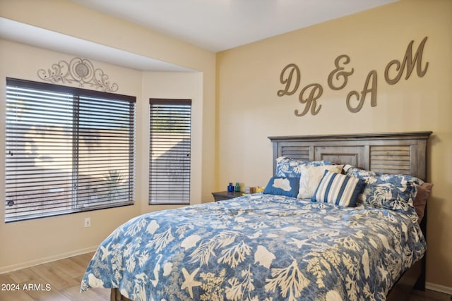 bedroom with light hardwood / wood-style flooring