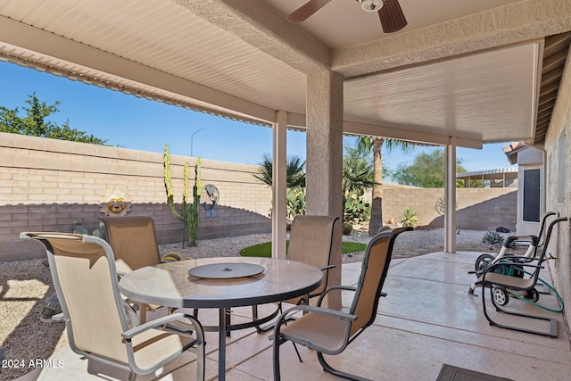 view of patio / terrace featuring ceiling fan