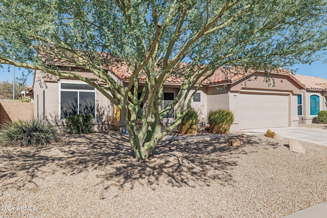 view of front of home with a garage