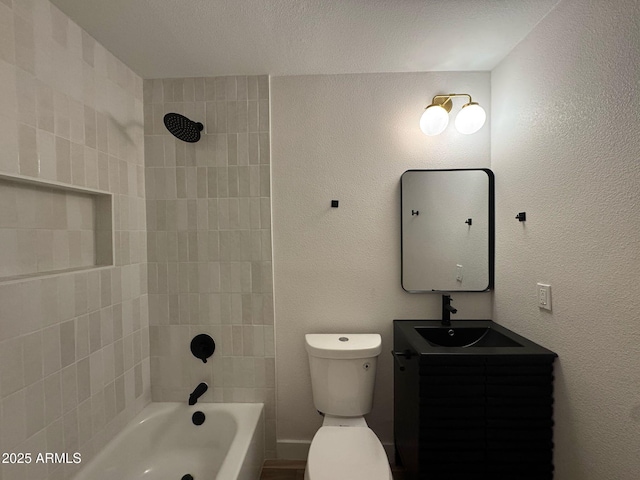 full bathroom featuring toilet,  shower combination, and vanity