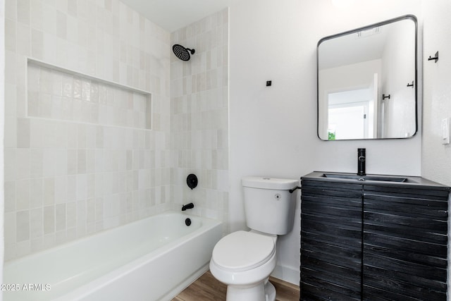 full bath featuring vanity, toilet, shower / bathtub combination, and wood finished floors
