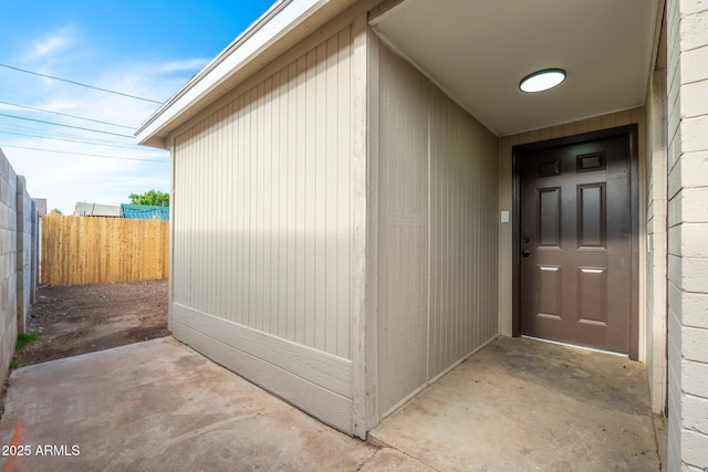 property entrance with fence