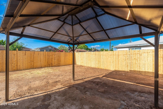 view of yard with a gazebo and fence