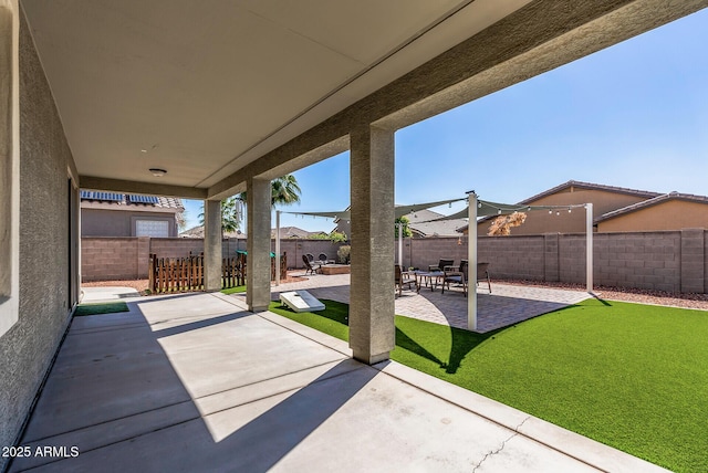 view of patio with a fenced backyard