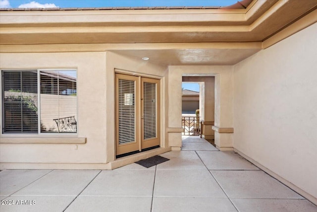 doorway to property with a patio area