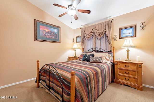 bedroom featuring light carpet, a ceiling fan, baseboards, and vaulted ceiling