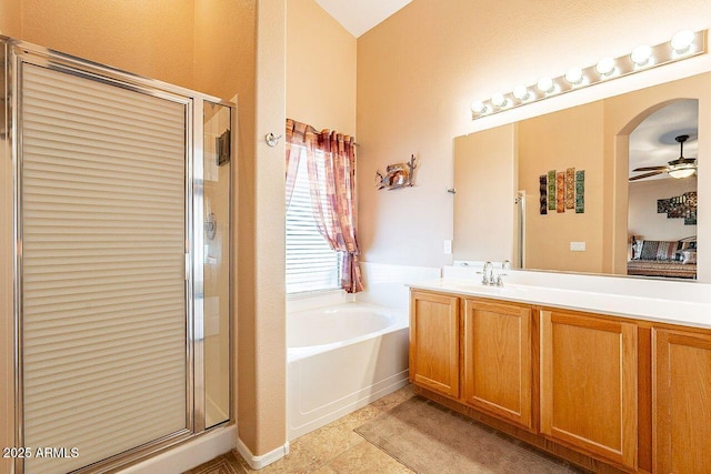 full bath featuring a bath, tile patterned flooring, a stall shower, and vanity