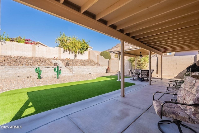 view of patio featuring a fenced backyard