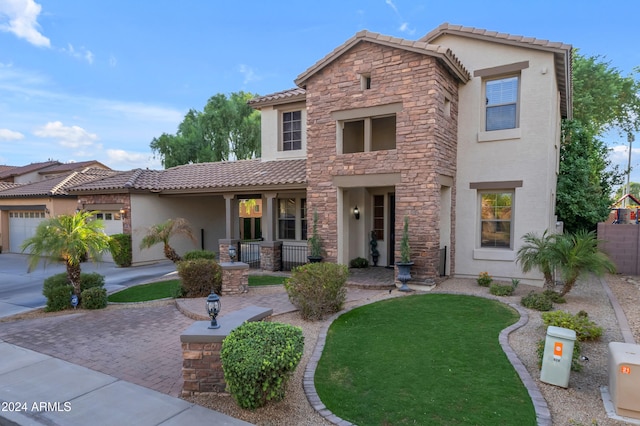 view of front of home with a garage