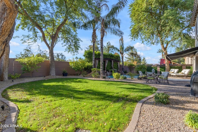 view of yard with a patio area