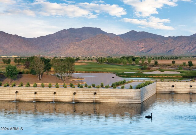 view of mountain feature featuring a water view