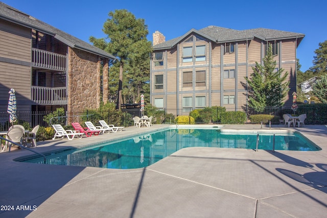 view of pool with a patio area