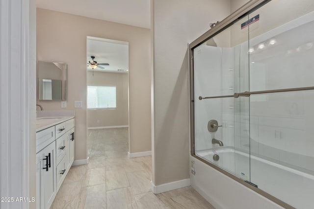 14646 S Brook Hollow Rd, Arizona City, AZ 85123 - bathroom with vanity, baseboards, a ceiling fan, and shower / bath combination with glass door