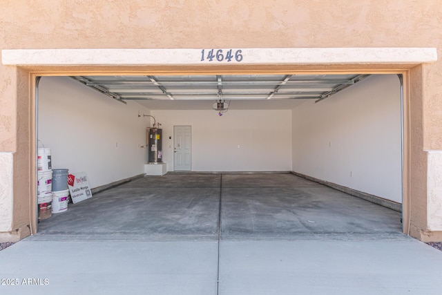14646 S Brook Hollow Rd, Arizona City, AZ 85123 - garage with a garage door opener, electric water heater, and gas water heater