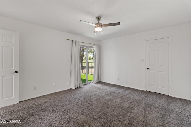 18206 N 45th Ave, Glendale, AZ 85308 - empty room featuring a ceiling fan, dark carpet, and baseboards