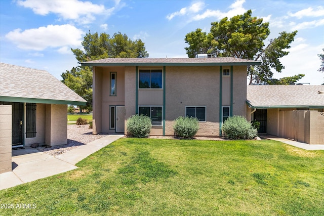 18206 N 45th Ave, Glendale, AZ 85308 - rear view of property featuring a yard and stucco siding
