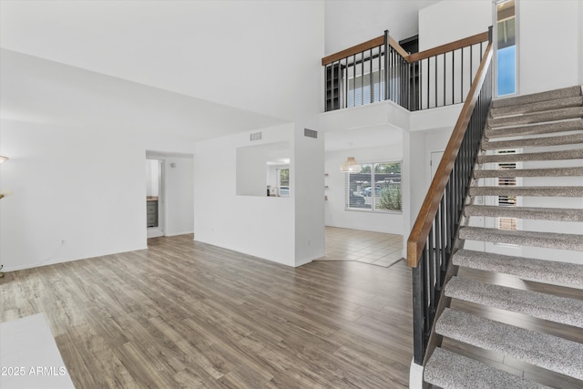 18206 N 45th Ave, Glendale, AZ 85308 - stairs featuring wood finished floors and a towering ceiling