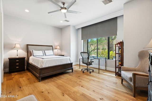 bedroom with light wood-type flooring, baseboards, visible vents, and recessed lighting