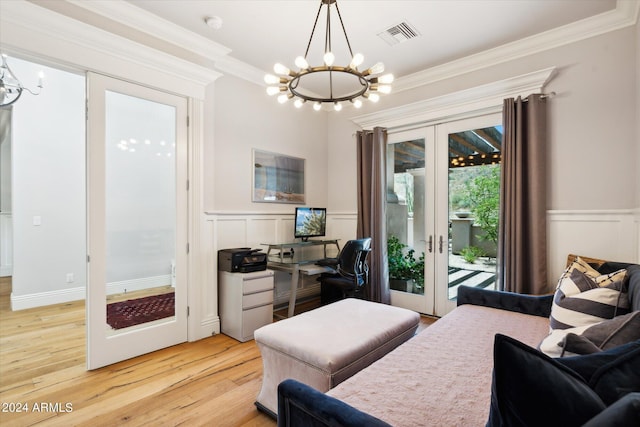 bedroom with ornamental molding, access to outside, french doors, and a notable chandelier