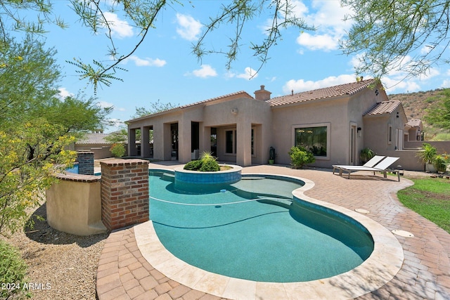 pool featuring a patio