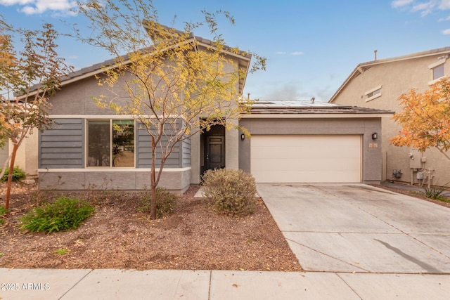 view of front of property featuring a garage