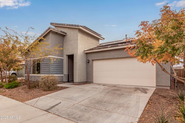 view of front of home featuring a garage