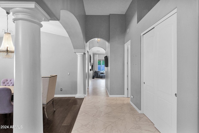 hallway featuring ornate columns