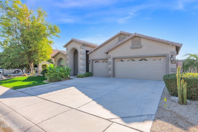 view of front of property featuring a garage