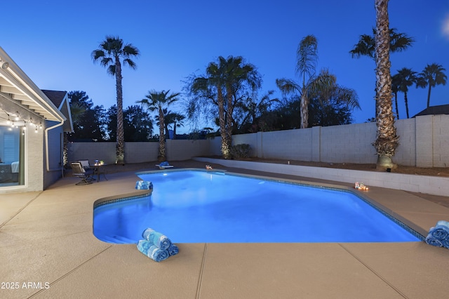6102 E Nisbet Rd, Scottsdale, AZ 85254 - pool at dusk with a patio