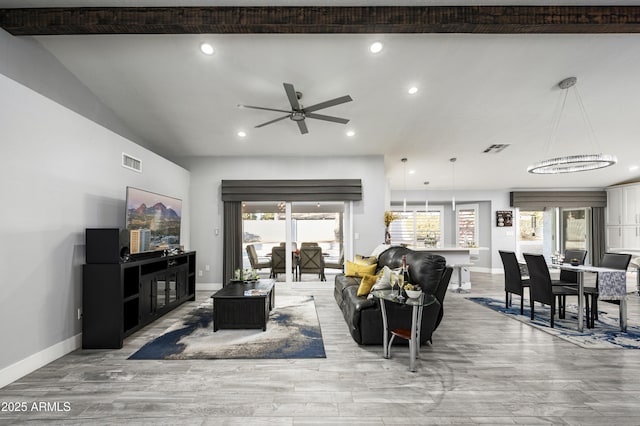 6102 E Nisbet Rd, Scottsdale, AZ 85254 - living room with ceiling fan, a healthy amount of sunlight, and light hardwood / wood-style floors