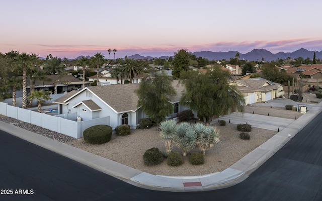 6102 E Nisbet Rd, Scottsdale, AZ 85254 - aerial view at dusk with a mountain view