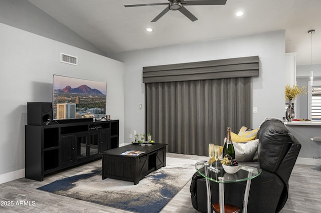 6102 E Nisbet Rd, Scottsdale, AZ 85254 - living room with vaulted ceiling, ceiling fan, and hardwood / wood-style floors