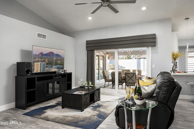 6102 E Nisbet Rd, Scottsdale, AZ 85254 - living room with ceiling fan, lofted ceiling, and hardwood / wood-style floors