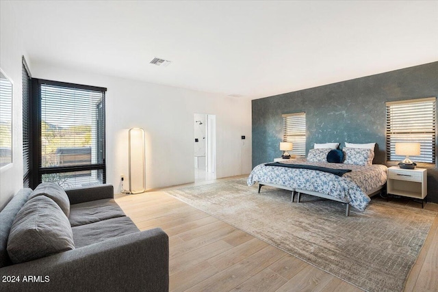 bedroom featuring light wood-type flooring