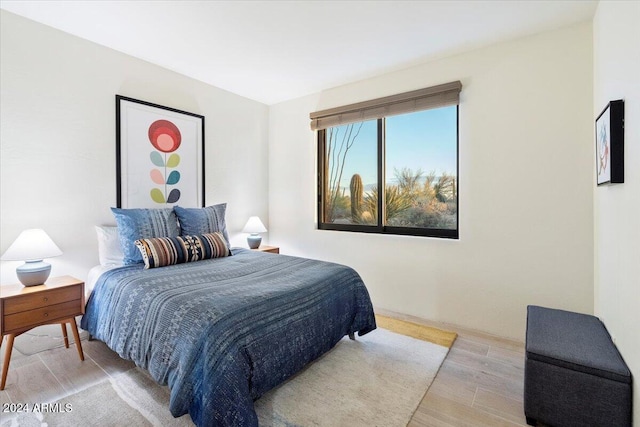 bedroom featuring light wood-type flooring